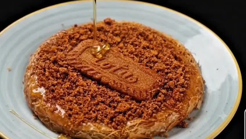 Supplied dessert film: a biscuit-topped dessert with syrup.